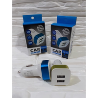 Batok Charger Mobil Saver Dual Output 2 USB Car Adapter Charger Cas Casan
